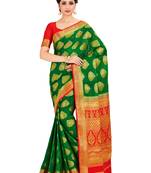 green hand woven crepe saree with blouse