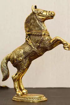 eCraftIndia Golden Jumping Horse Metal Animal Figurine Decorative Showpiece
