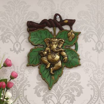 eCraftIndia Dancing Golden Lord Ganesha  on Green Leaf Metal Wall Hanging 1
