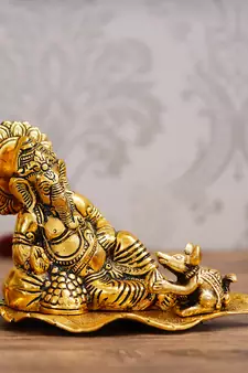 eCraftIndia Golden Resting Ganesha With Mushak Metal Decorative Showpiece