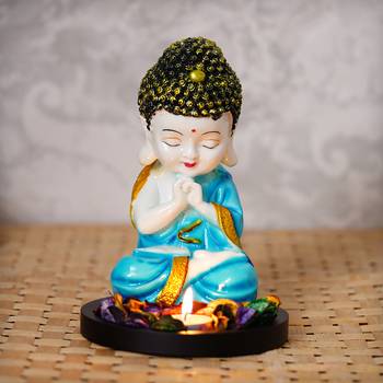 eCraftIndia Praying Blue Monk Buddha with Wooden Base, Fragranced Petals and Tealight 1