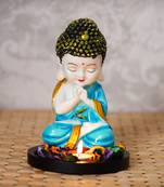 eCraftIndia Praying Blue Monk Buddha with Wooden Base, Fragranced Petals and Tealight