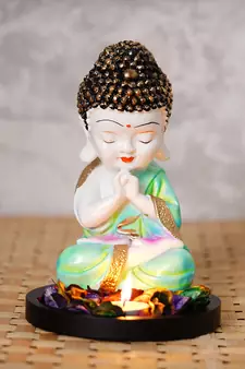 eCraftIndia Praying Green Monk Buddha with Wooden Base, Fragranced Petals and Tealight