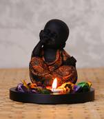 eCraftIndia Decorative Smiling Copper Monk Buddha with Wooden Base, Fragranced Petals and Tealight