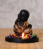 eCraftIndia Decorative Smiling Golden Monk Buddha with Wooden Base, Fragranced Petals and Tealight