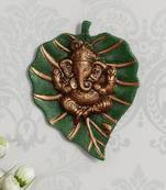 eCraftIndia Brown Lord Ganesha on Green Leaf Wall Hanging