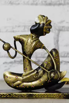 eCraftIndia Tribal Man with Pagdhi Playing Musical Instrument Banjo Decorative Showpiece