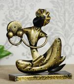 eCraftIndia Tribal Man with Pagdhi Playing Musical Instrument Decorative Showpiece