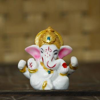 white lord ganesha idol with golden mukut 2