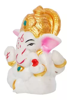 white lord ganesha idol with golden mukut