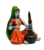 Rajasthani Lady using Makhan Handi