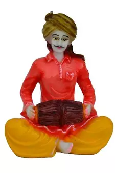 Rajasthani Musician Statue Playing Dholak