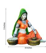 Rajasthani Lady using Flour Machine