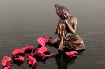 Metal Resting Buddha on Knee 1