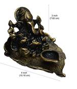 Metal Lord Ganesha with Diya on Leaf
