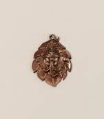 Metal wall hanging of Lord Ganesha Head on Creative Leaf