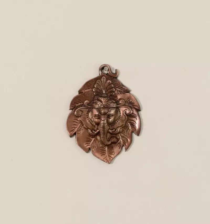 Metal wall hanging of Lord Ganesha Head on Creative Leaf