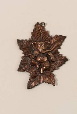 Metal wall hanging of Lord Ganesha on Maple Leaf 1
