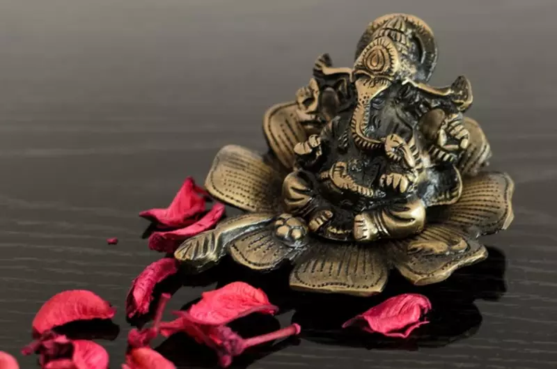 Metal Lord Ganesha on Flower