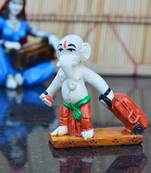 Polyresin Ganesha with Luggage on Vacation Showpiece