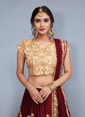 Maroon embroidered velvet semi stitched lehenga 2