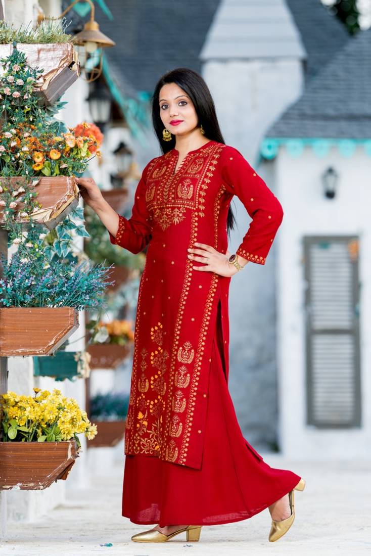Addiction Red Gold Glitter Printed Rayon Kurti Paired With Printed Flared Palazzo