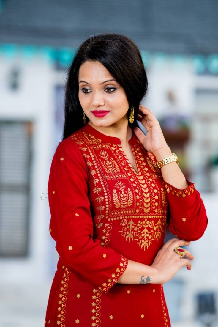 Addiction Red Gold Glitter Printed Rayon Kurti Paired With Printed Flared Palazzo