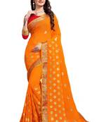 Orange embroidered georgette saree with blouse