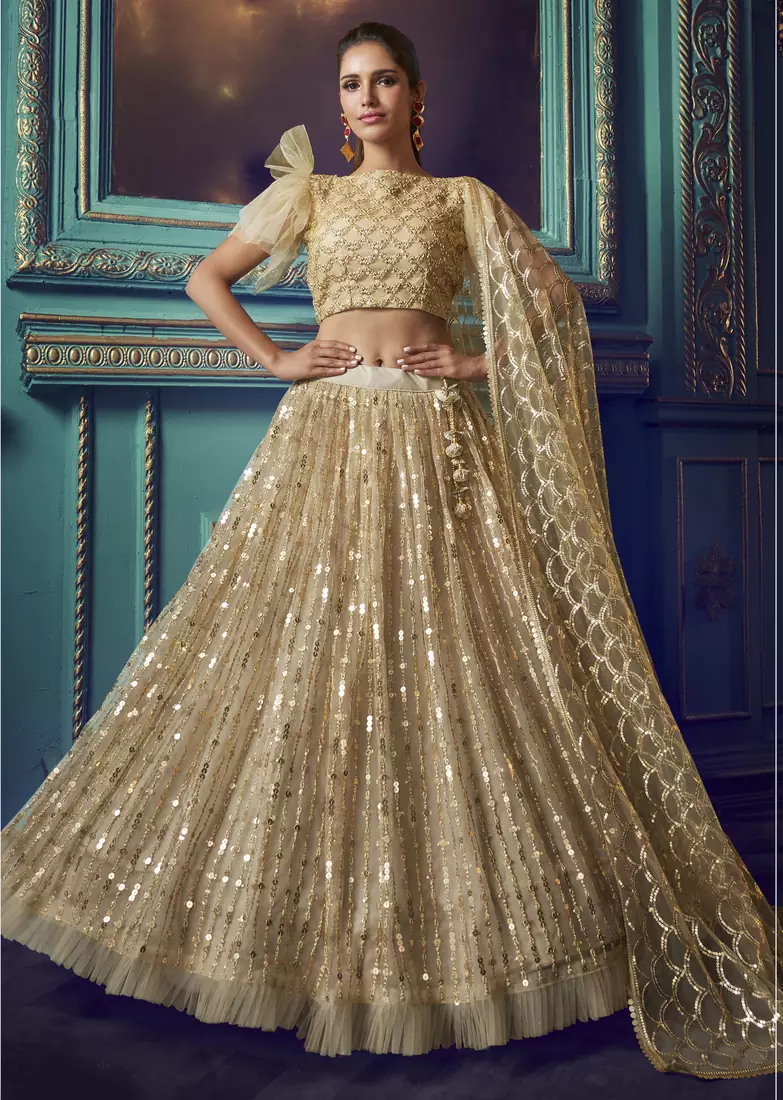 Seductive Dusky Beige Sequins embroidered net fabric lehenga choli for bride
