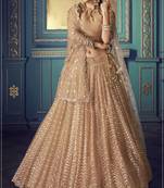 Glamorous Beige Colored Sequins embroidered Net Fabric Lehenga choli for wedding