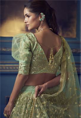 Graceful Green Sequins and Dori embroidered and ruffle worked net fabric lehenga choli for bride 2