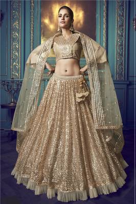 Mesmerizing Beige Sequins embroidered and Ruffle work net fabric bridal lehenga 1