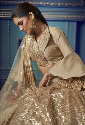 Mesmerizing Beige Sequins embroidered and Ruffle work net fabric bridal lehenga 2