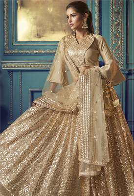 Mesmerizing Beige Sequins embroidered and Ruffle work net fabric bridal lehenga 3