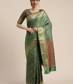 Green woven silk blend saree with blouse