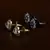 Gold and Black Gold Plated Two Pairs of American Diamond Studs 216ED422