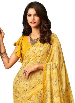 Yellow printed faux georgette saree with blouse 2