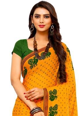 Yellow printed faux georgette saree with blouse 2