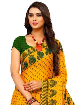 Yellow printed faux georgette saree with blouse 2