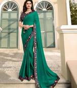 Dark sea green embroidered silk saree with blouse