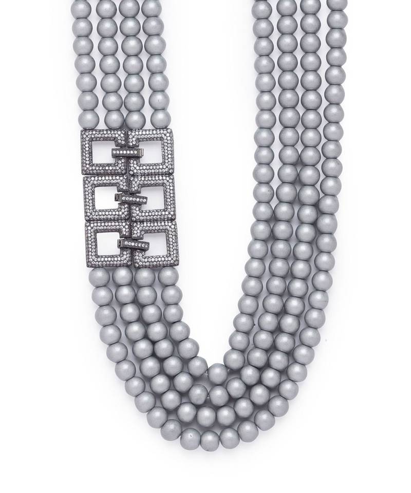 Grey multi-layered shell pearls with a base material of brass to provide rigidity