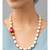 Gold single-layered necklace with agate Swarovski beads.