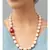 Gold single-layered necklace with agate Swarovski beads.