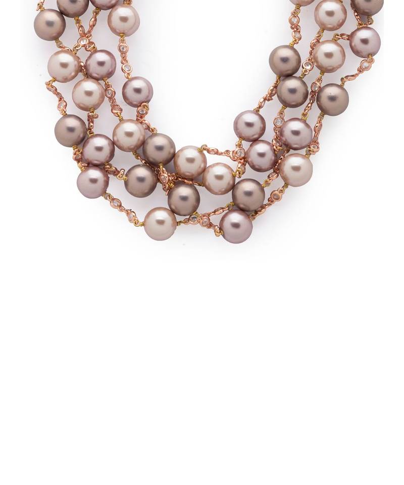 The rose pink shell pearls of Swarovski  beauty on the threads.