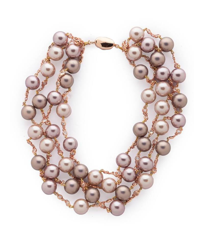 The rose pink shell pearls of Swarovski  beauty on the threads.