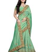 Light green embroidered silk saree with blouse