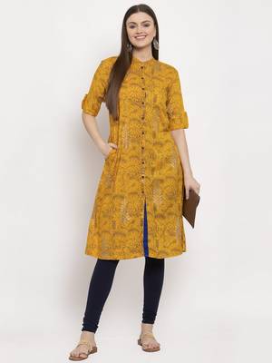 Yellow printed rayon kurtas-and-kurtis 5