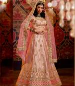 Peach embroidered silk semi stitched lehenga