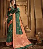 Green woven banarasi silk saree with blouse