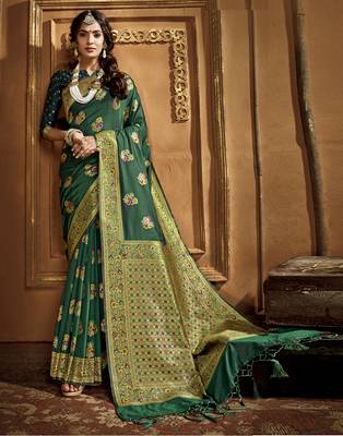 Green woven banarasi silk saree with blouse 1